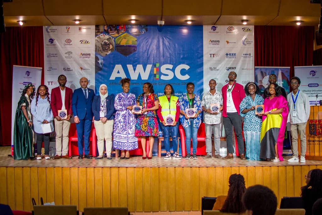 Attendees engaging at an AWIS community event