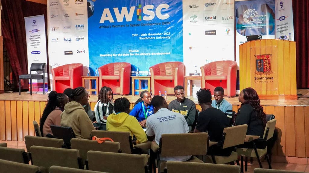 A mentor guiding a mentee at an AWIS session